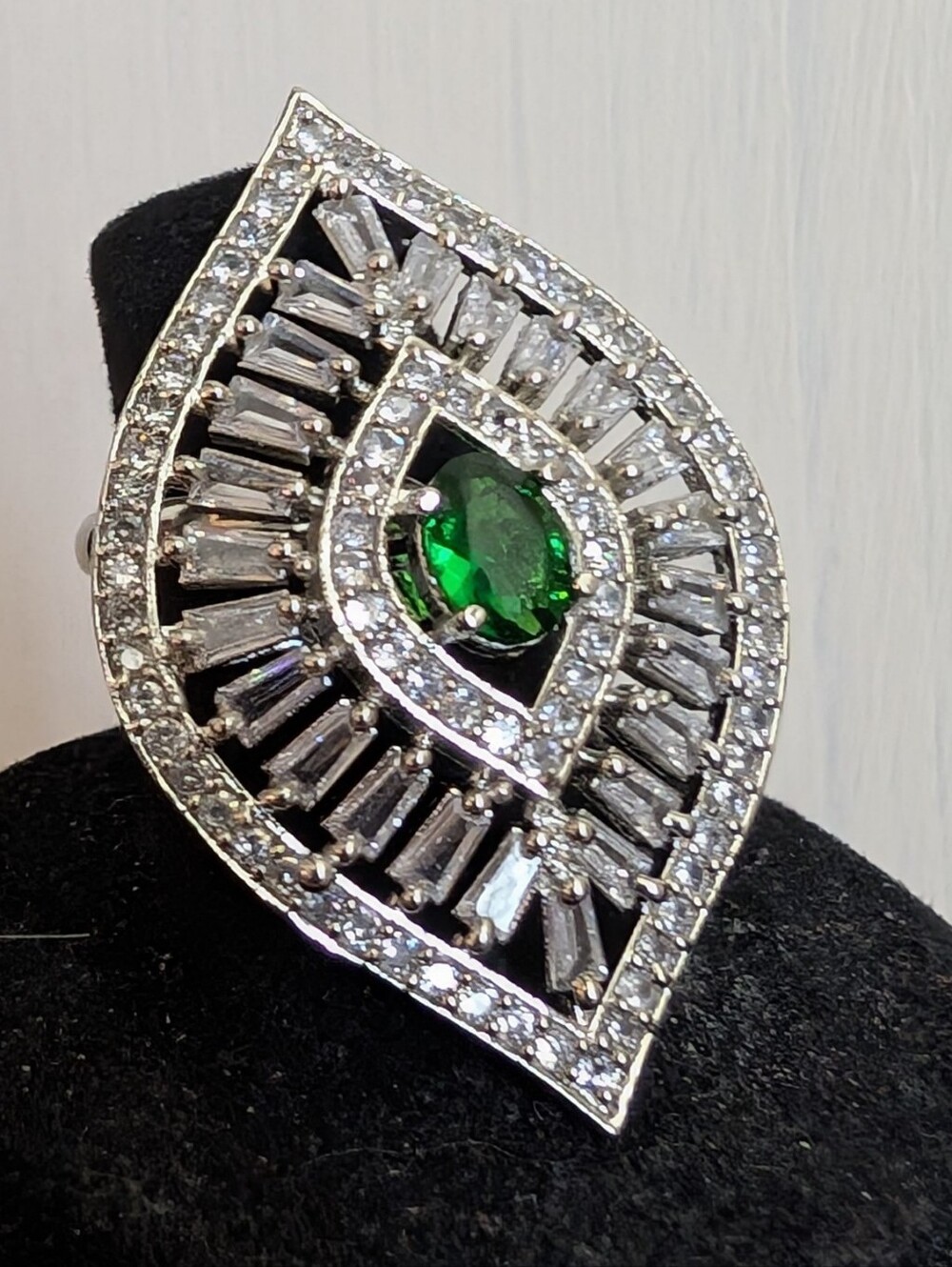 #29. Emerald & Baguette Cocktail Ring